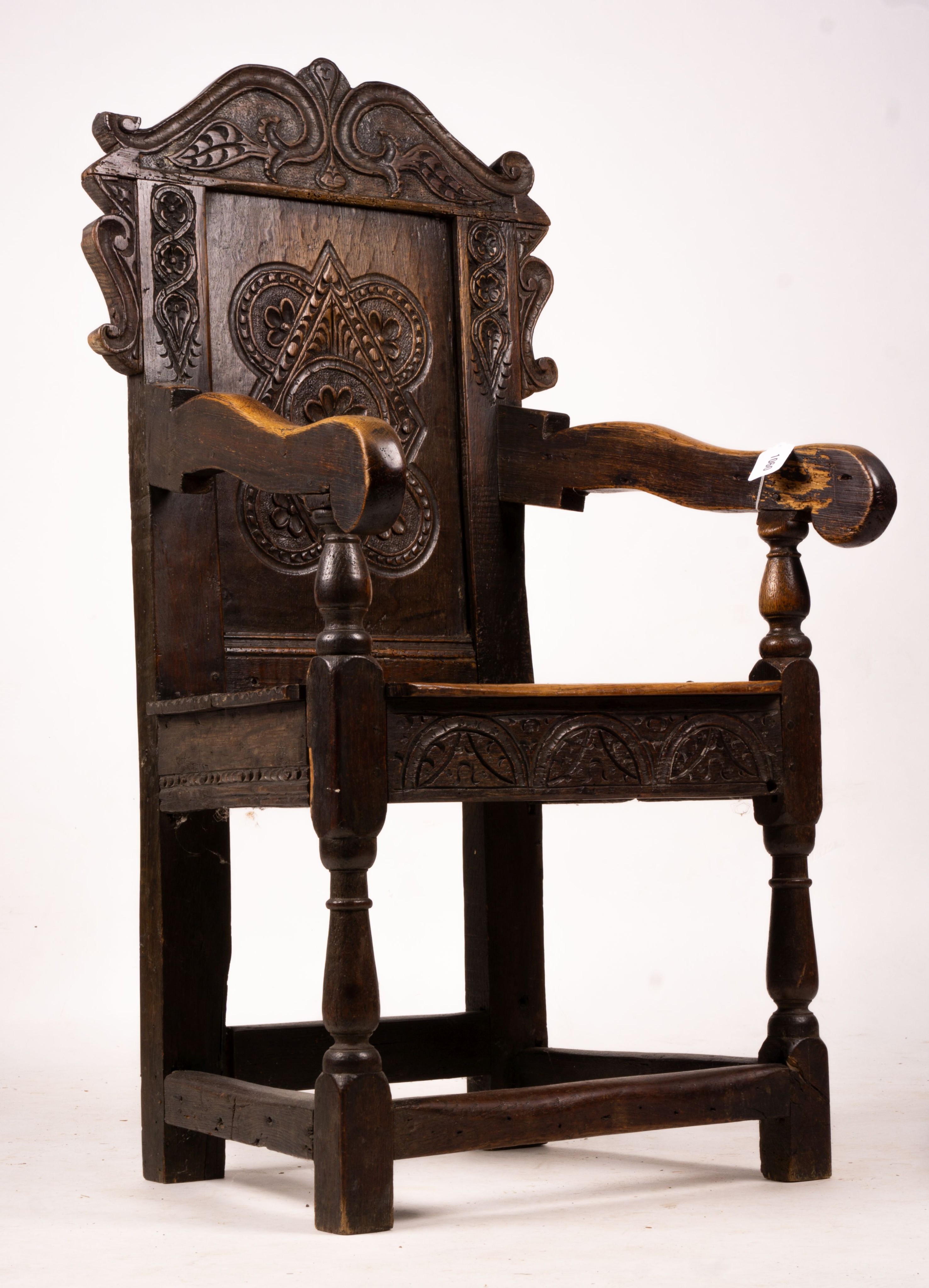 A 17th century style oak Wainscot chair, width 54cm, depth 52cm, height 104cm